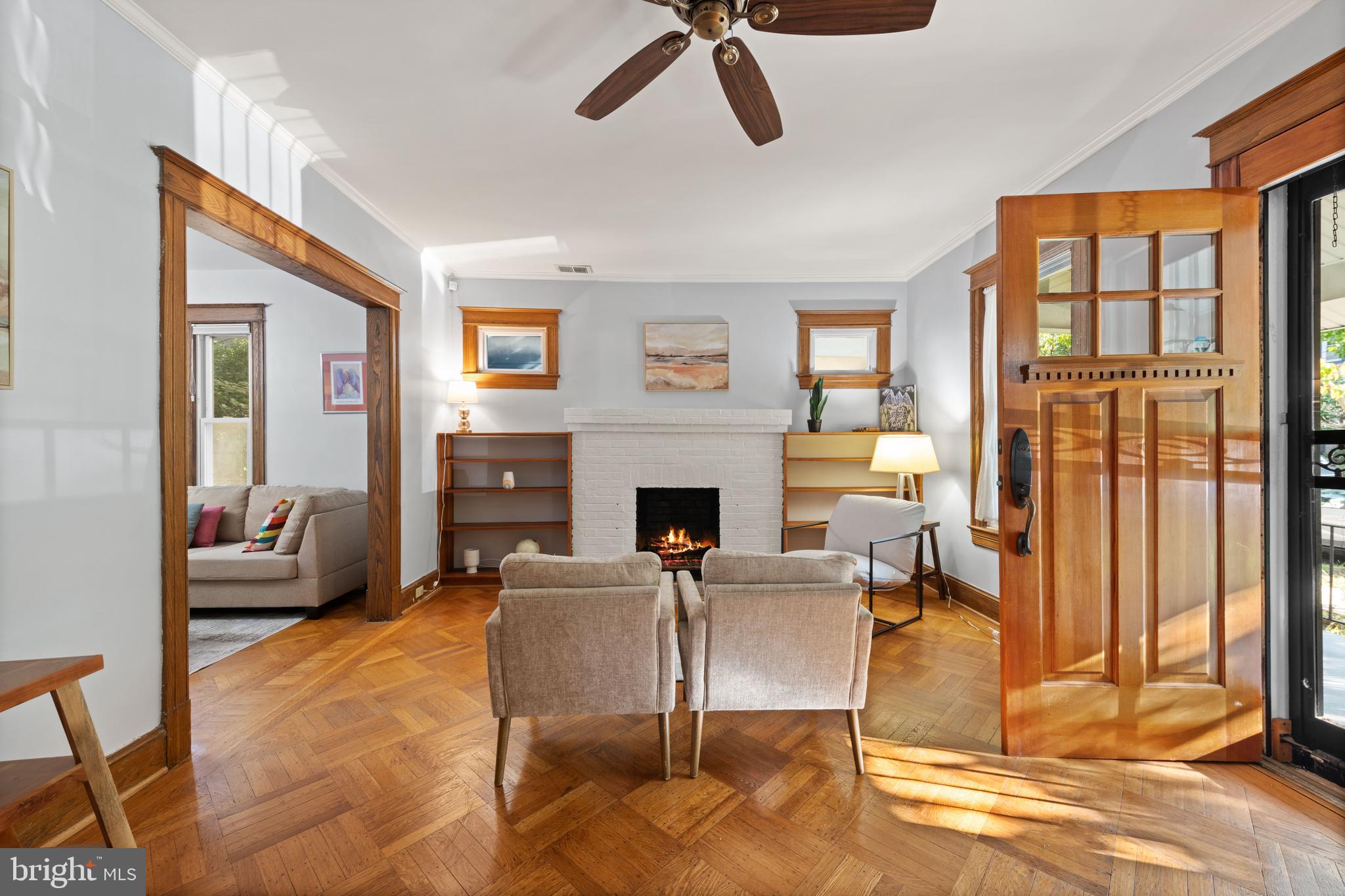 4110 4th Street Northwest Washington, DC 20011 - Photo 9 of 46 a living room with furniture a flat screen tv and a fireplace
