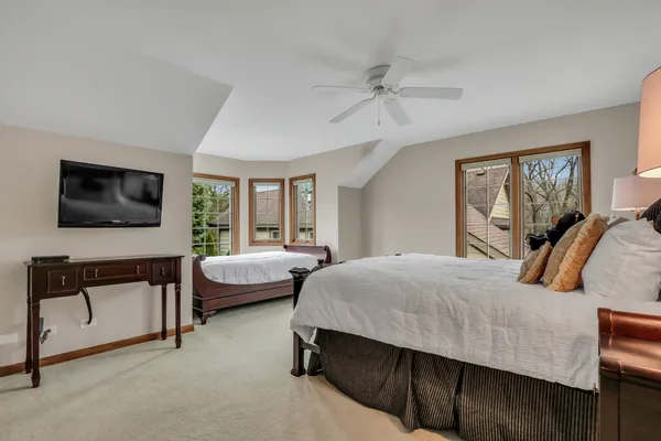 a bed room with a bed and a couch
