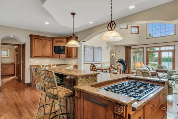 a kitchen with a table and chairs in it