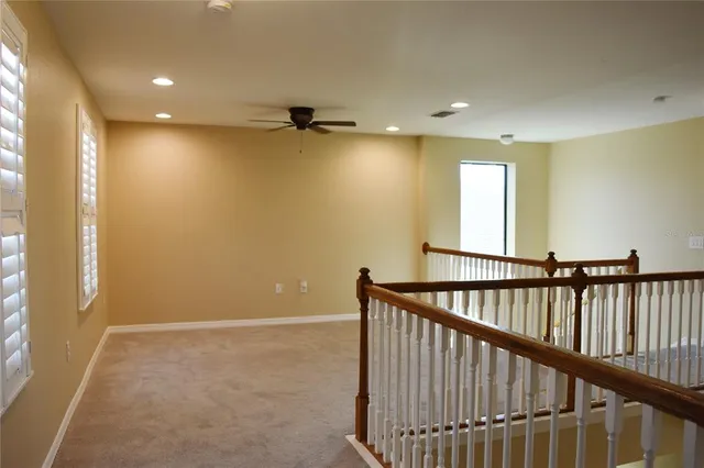 a view of hallway with stairs