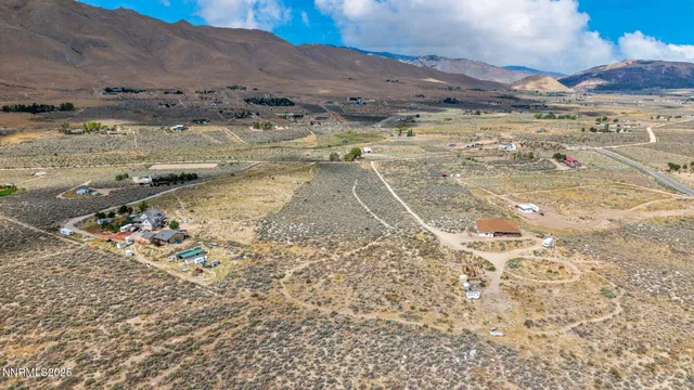 a view of a backyard of a house