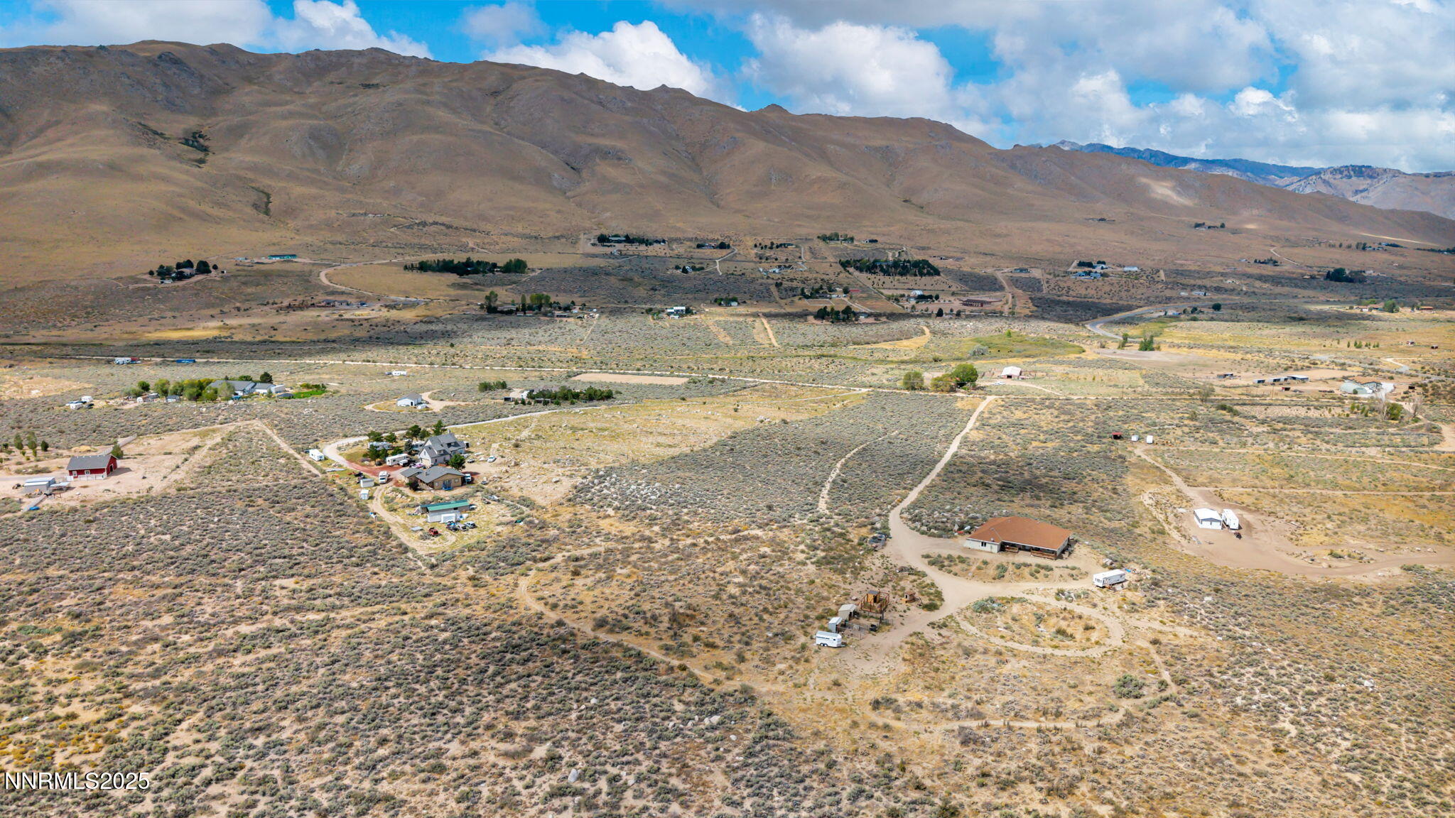 15710 Rancho Drive Reno, NV 89508 - Photo 4 of 7 a view of a backyard of a house