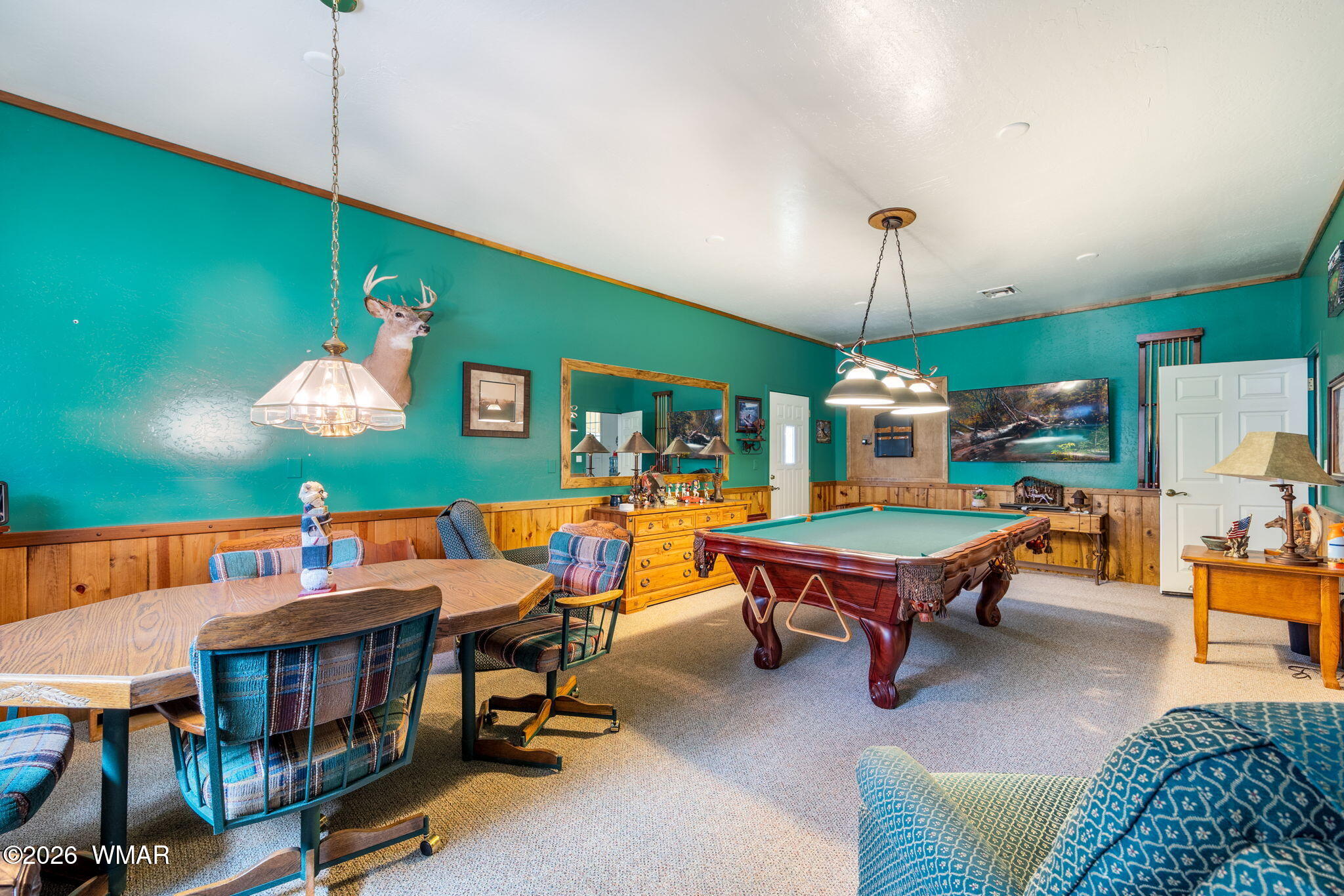 2922 Pine Rim Road Overgaard, AZ 85933 - Photo 33 of 58 a living room with furniture a table and chairs