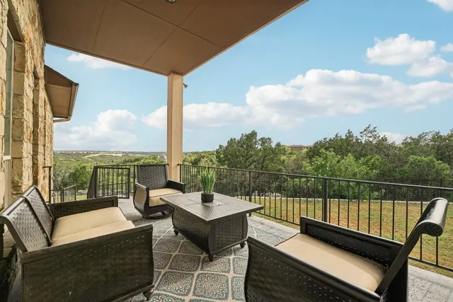 a view of a roof deck with couches
