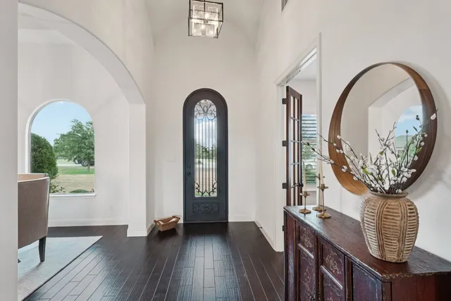 a view of a livingroom with furniture and wooden floor