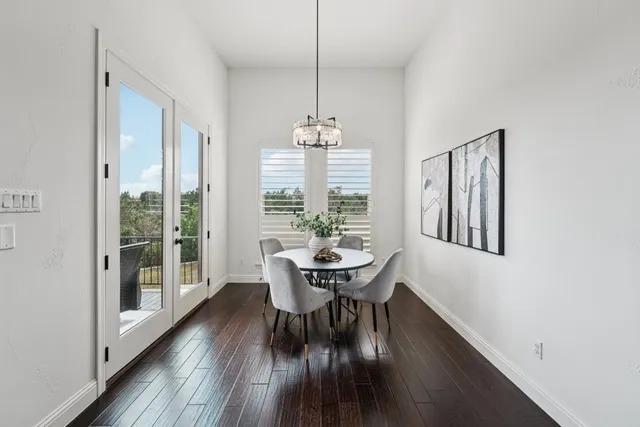 a dining room with furniture window wooden floor