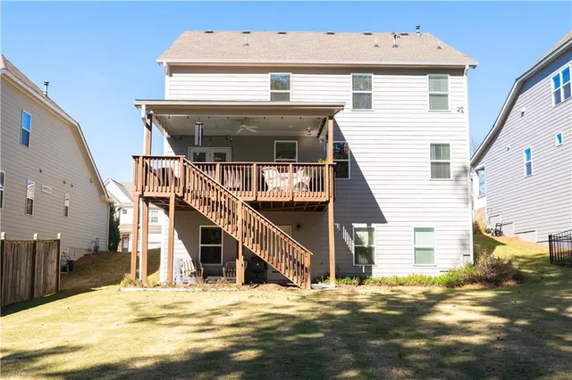 a view of a house with a street
