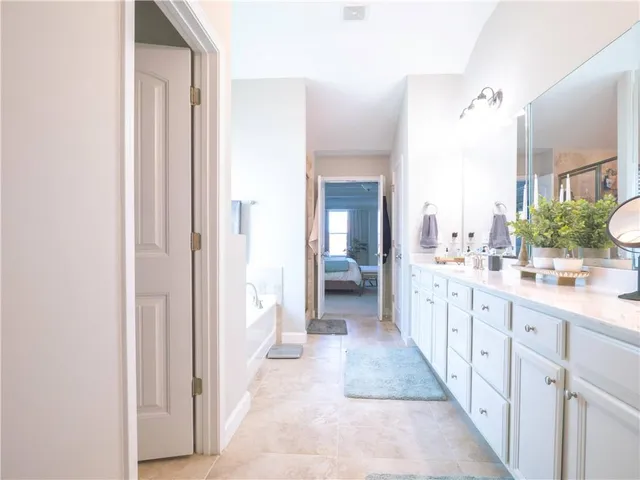 a view of a kitchen from the hallway
