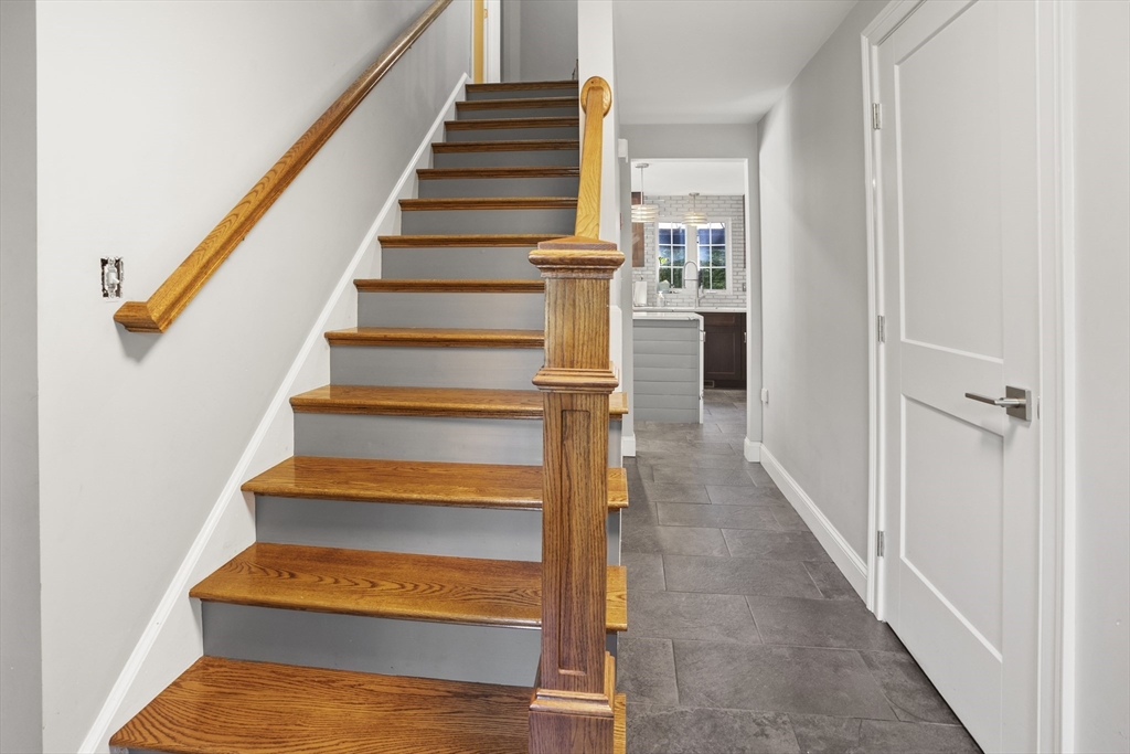 138 Walnut Street Douglas, MA 01516 - Photo 19 of 32 a view of entryway and hall with wooden floor