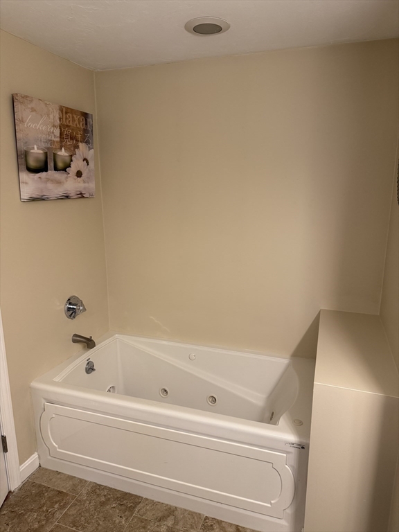 138 Walnut Street Douglas, MA 01516 - Photo 23 of 32 a bathroom with a bathtub