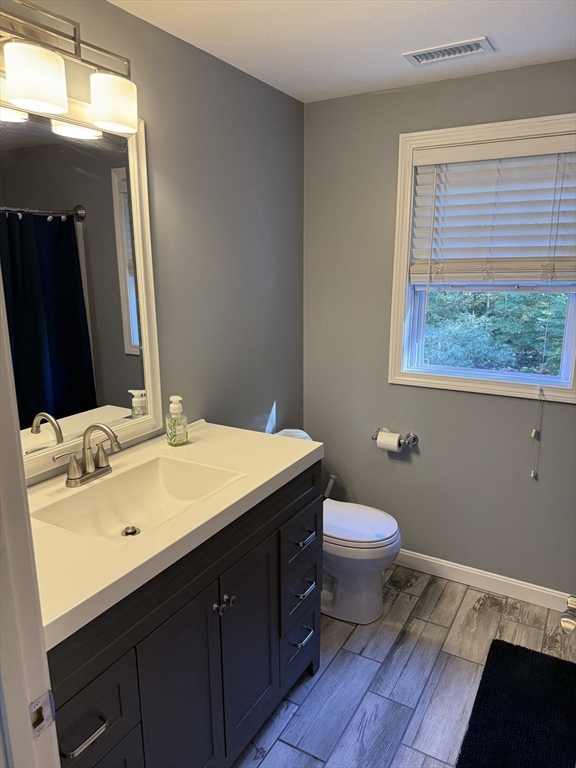 138 Walnut Street Douglas, MA 01516 - Photo 26 of 32 a bathroom with a sink toilet and mirror