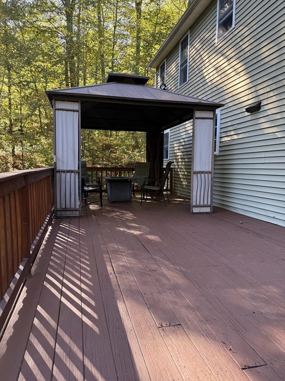 138 Walnut Street Douglas, MA 01516 - Photo 29 of 32 a view of a wooden floor with a roof deck