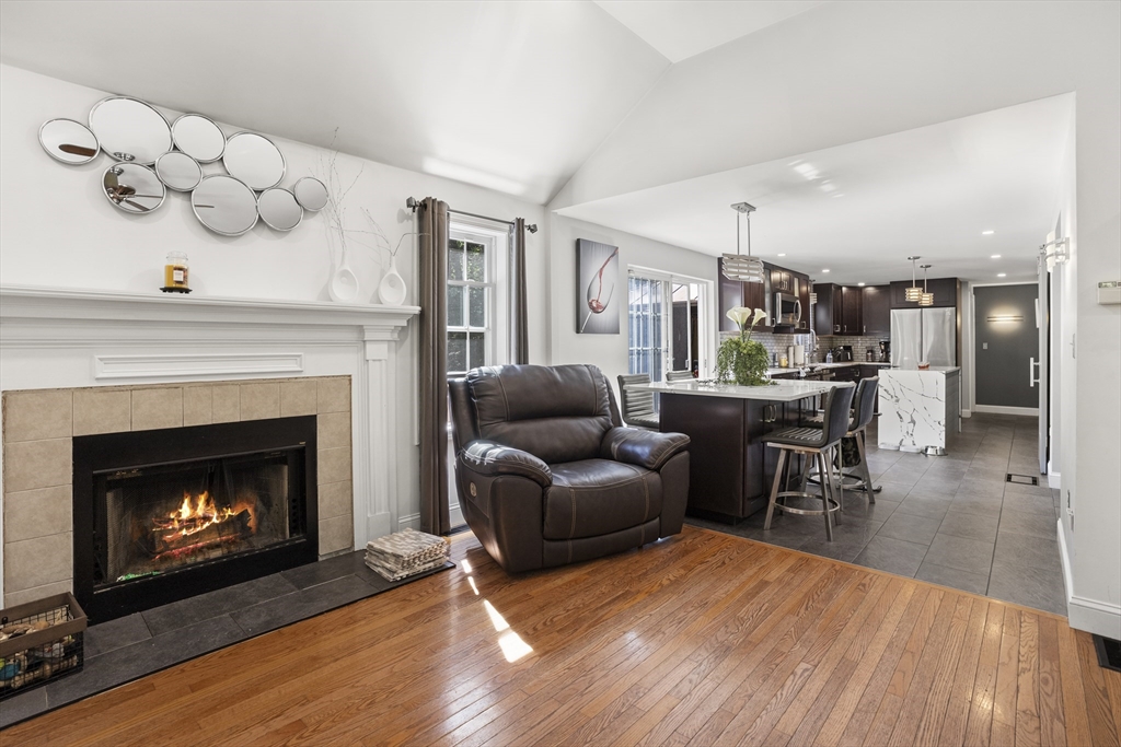 138 Walnut Street Douglas, MA 01516 - Photo 3 of 32 a living room with furniture a fireplace and wooden floor