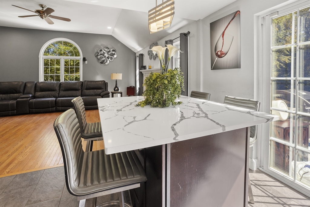 138 Walnut Street Douglas, MA 01516 - Photo 8 of 32 a view of a dining room with furniture window and wooden floor