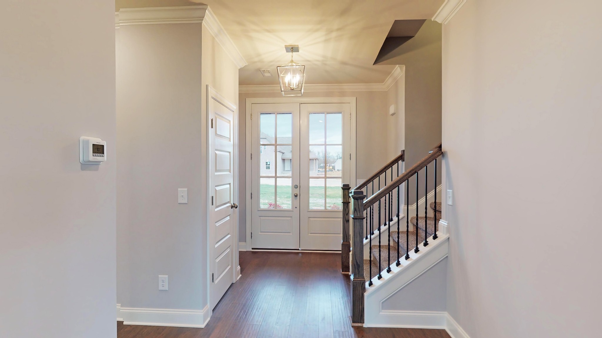 814 Ridgestone Place Lebanon, TN 37087 - Photo 2 of 16 a view of an entryway with wooden floor