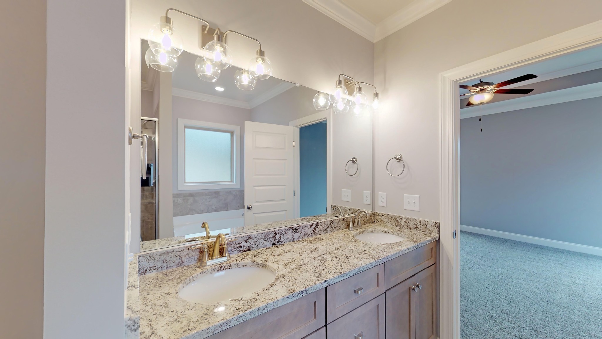 814 Ridgestone Place Lebanon, TN 37087 - Photo 14 of 16 a bathroom with a granite countertop sink a large mirror and a shower