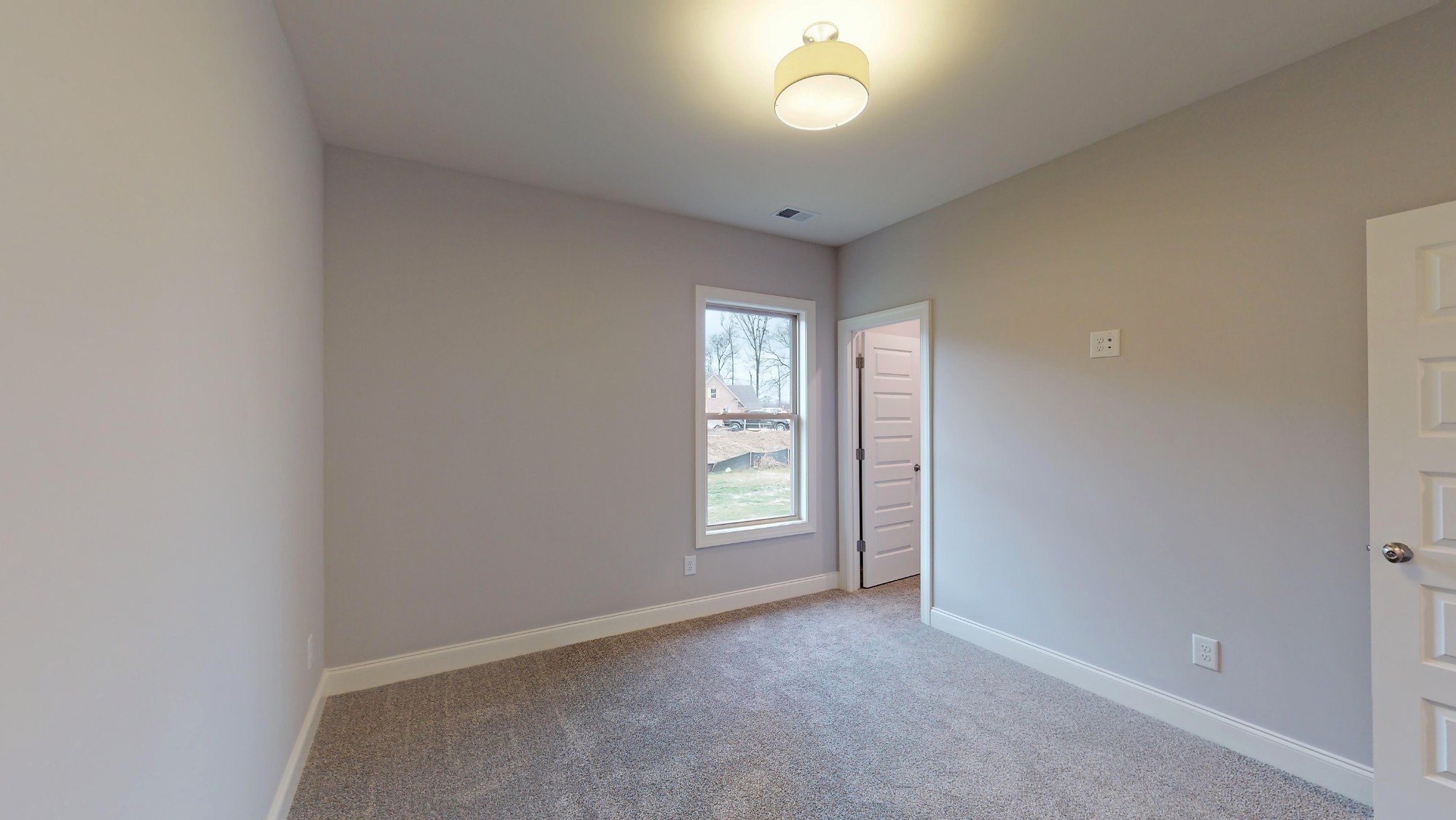 814 Ridgestone Place Lebanon, TN 37087 - Photo 16 of 16 an empty room with windows and closet