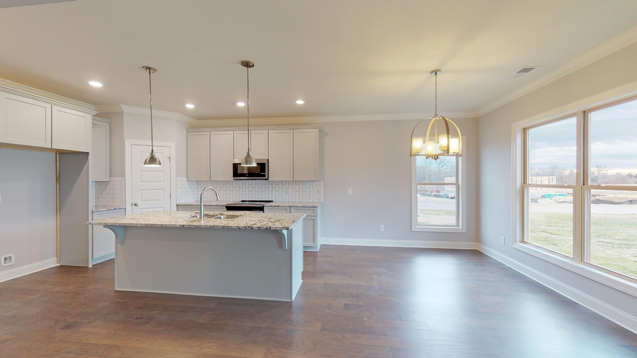 814 Ridgestone Place Lebanon, TN 37087 - Photo 5 of 16 a view of kitchen with granite countertop stainless steel appliances sink and wooden floor