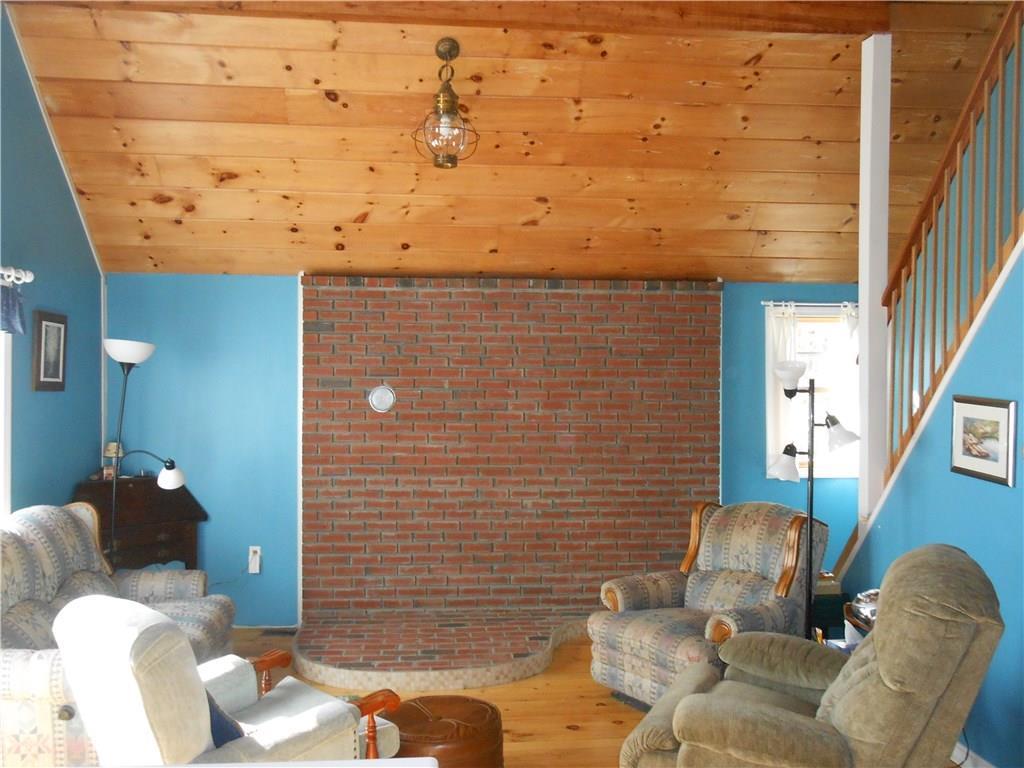 15 Pine Point Road Harrison, ME 04040 - Photo 6 of 33 Gorgeous brick hearth with tile trim...