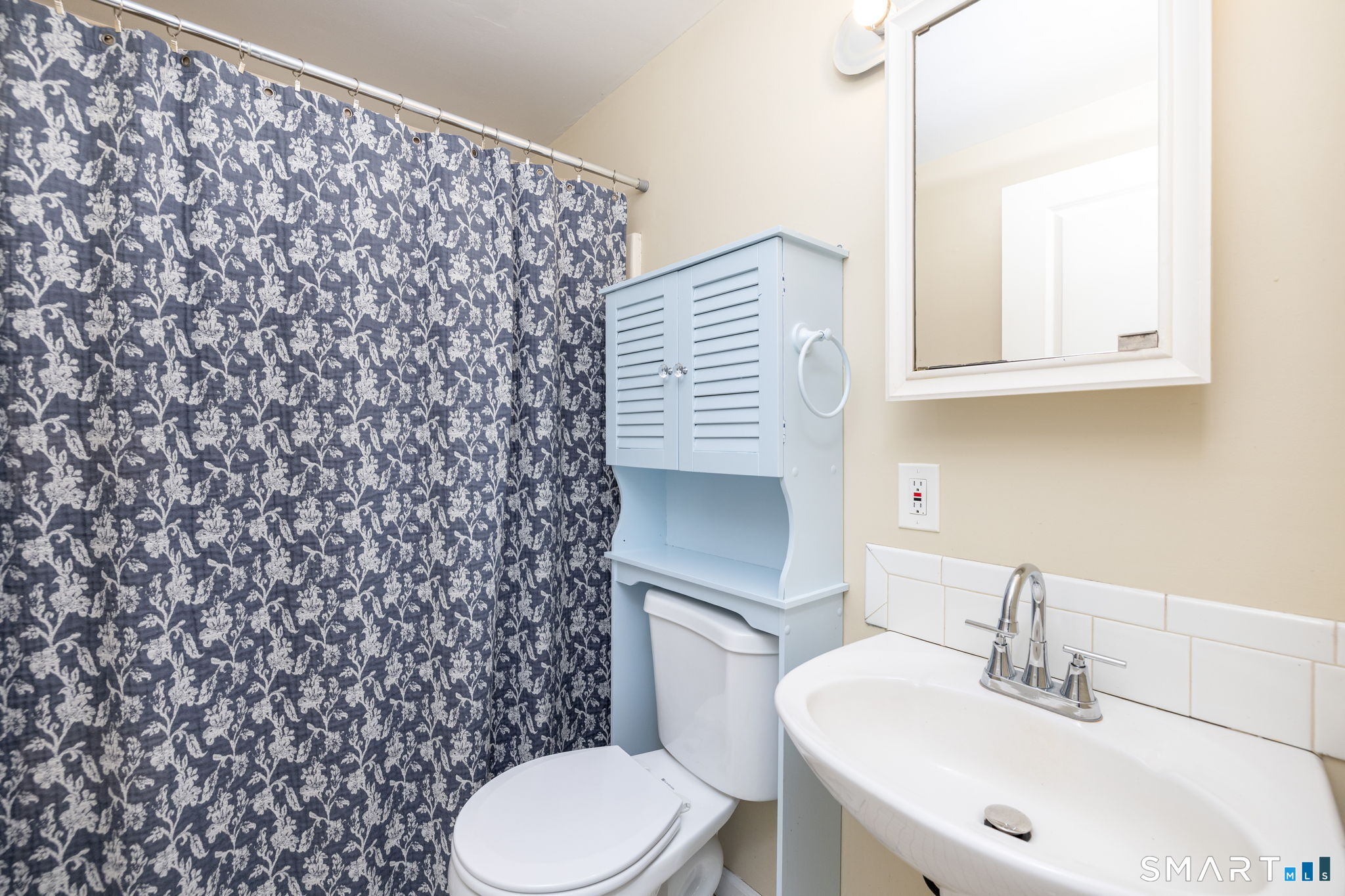 347 Griffin Road Suffield, CT 06093 - Photo 15 of 35 a bathroom with a sink toilet and a mirror