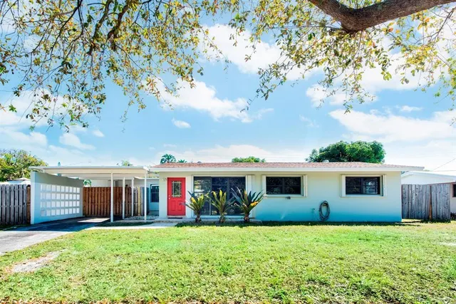 front view of a house with a yard