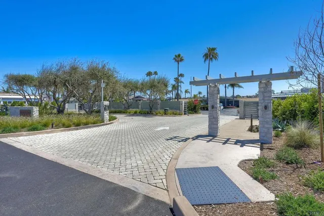 a view of a patio with table and chairs and potted plants