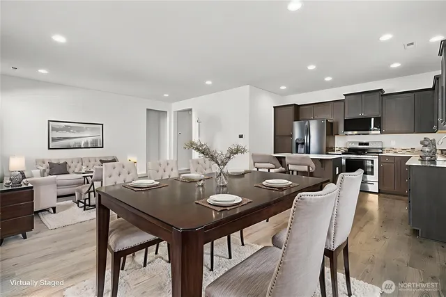 a view of a dining room with furniture
