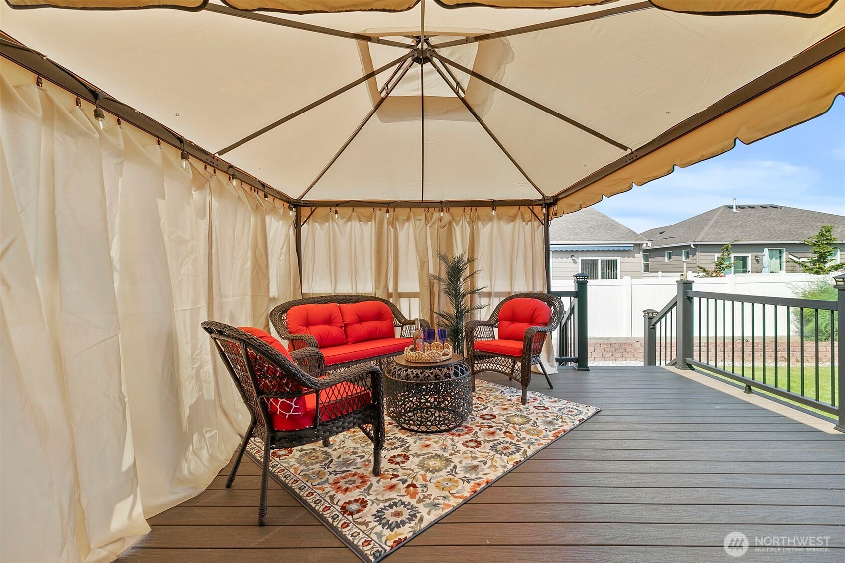 103 Hickory Avenue Southwest, Unit 35 Orting, WA 98360 - Photo 13 of 38 an outdoor space with seating
