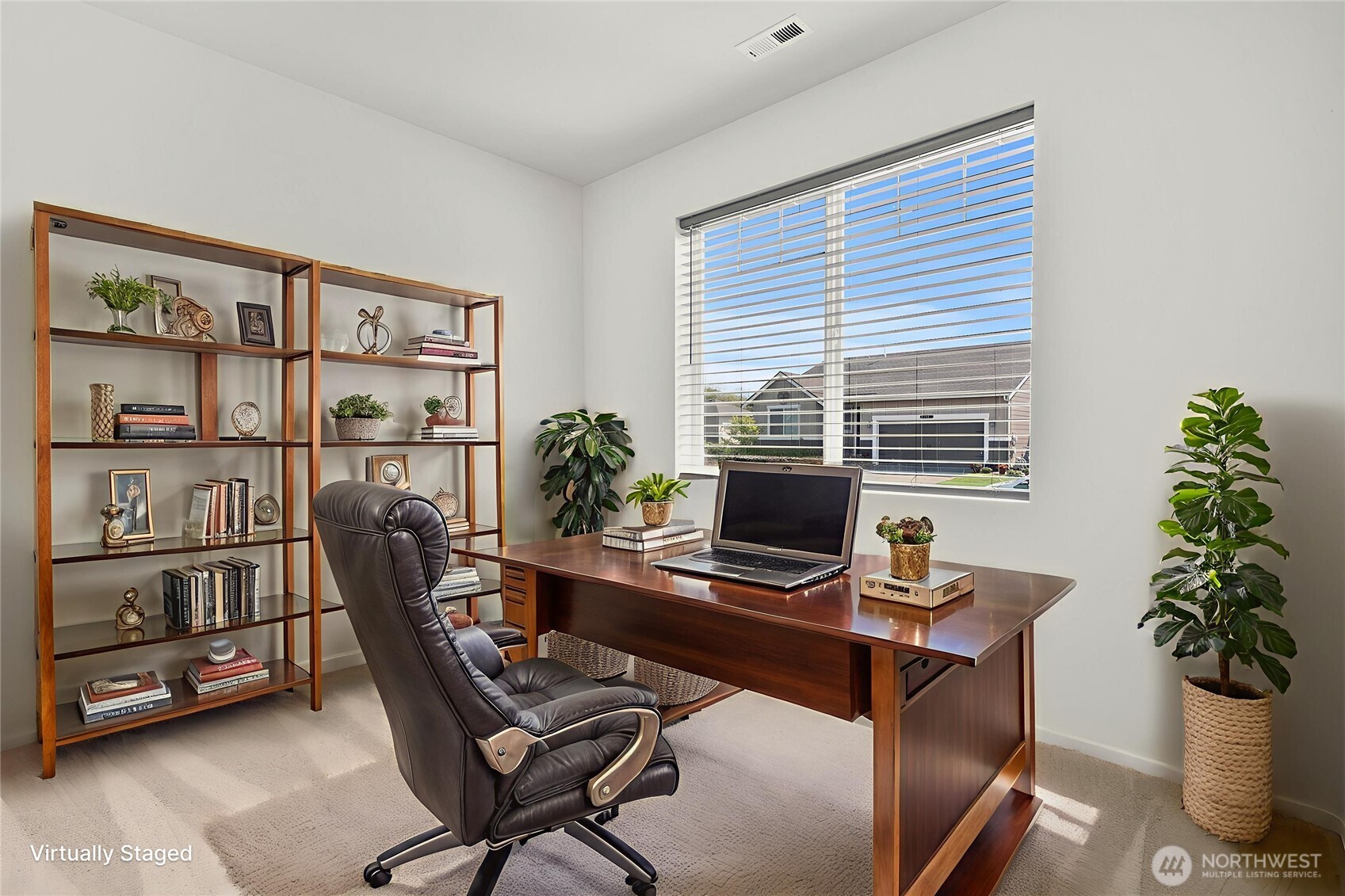103 Hickory Avenue Southwest, Unit 35 Orting, WA 98360 - Photo 20 of 38 a view of a workspace with furniture and a potted plant