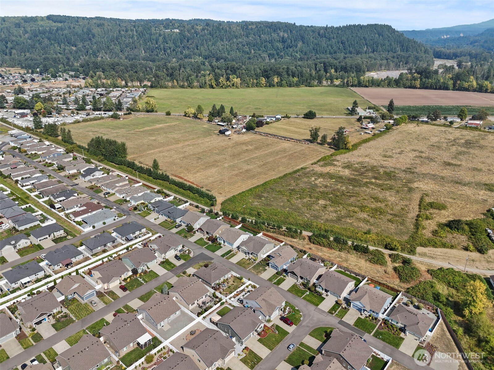 103 Hickory Avenue Southwest, Unit 35 Orting, WA 98360 - Photo 32 of 38 a view of an outdoor space and seating area