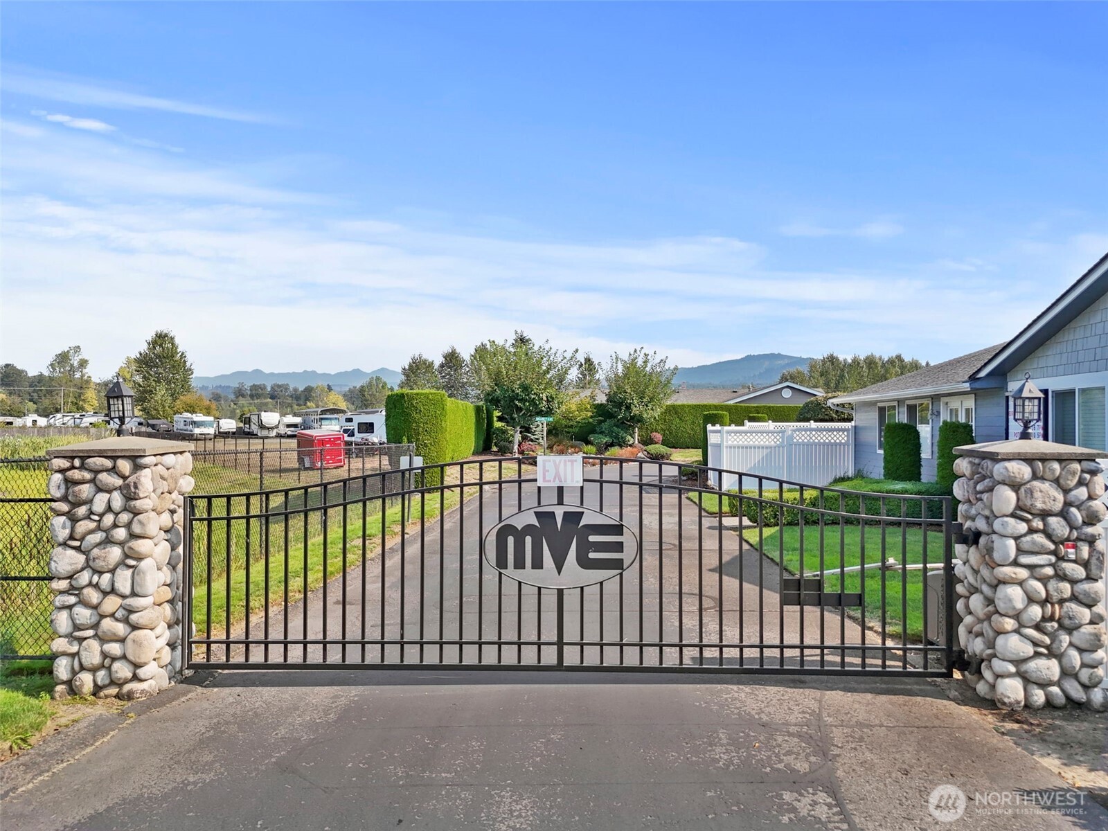 103 Hickory Avenue Southwest, Unit 35 Orting, WA 98360 - Photo 33 of 38 a view of a wrought fence