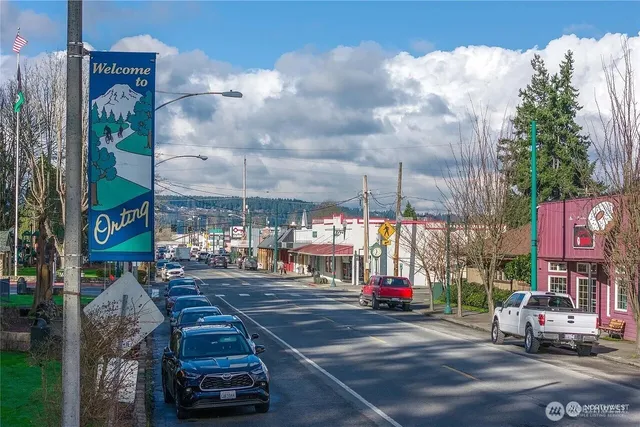 a view of parked cars on city street