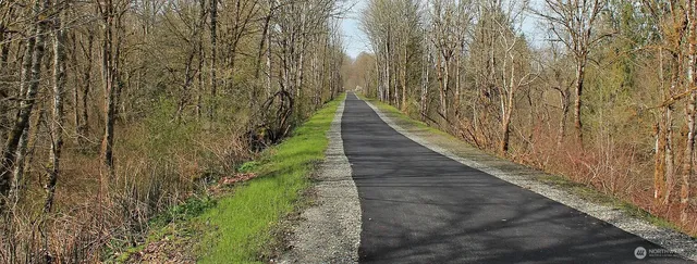 a balcony with wooden floor