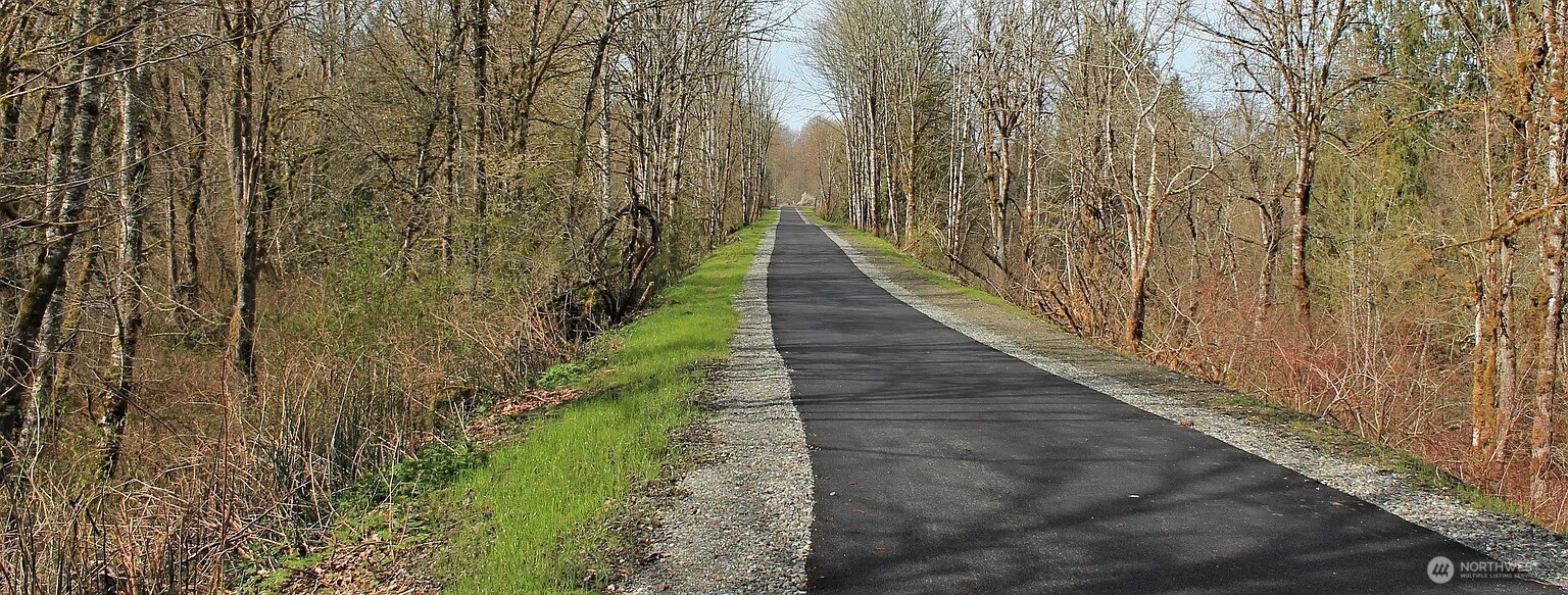 103 Hickory Avenue Southwest, Unit 35 Orting, WA 98360 - Photo 38 of 38 a balcony with wooden floor