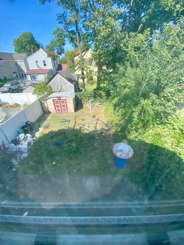 a view of a street with trees