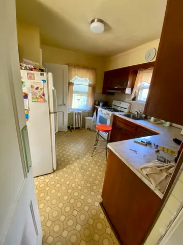 a room with furniture and a flat screen tv