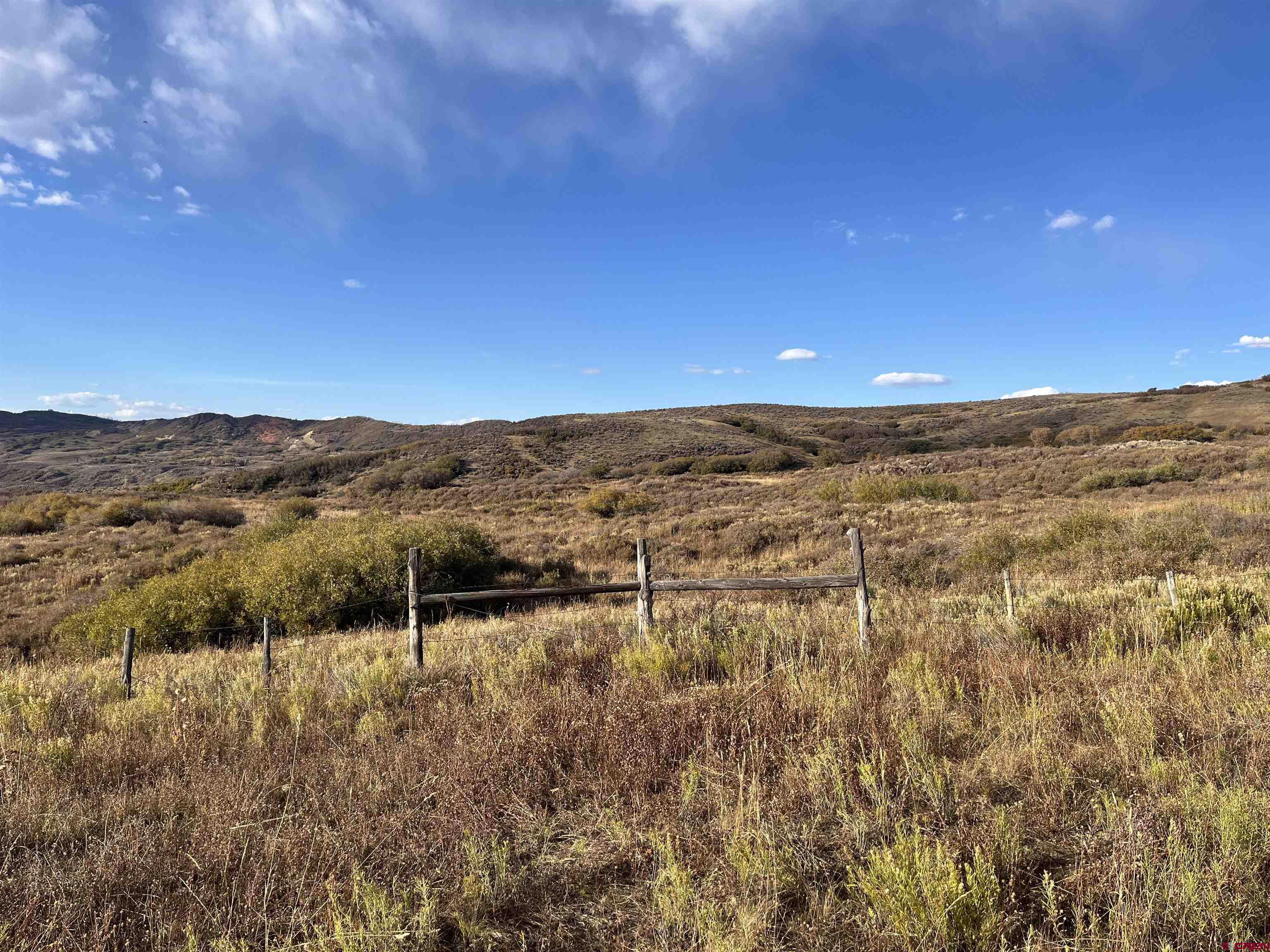 Tbd Q 72 Road Montrose, CO 81401 - Photo 6 of 12 a view of an outdoor space and a mountain view