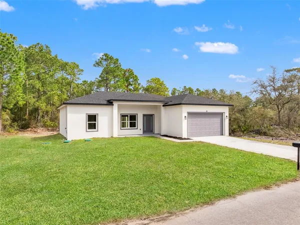 a house view with a garden space