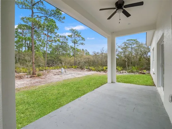 a view of a porch and garden