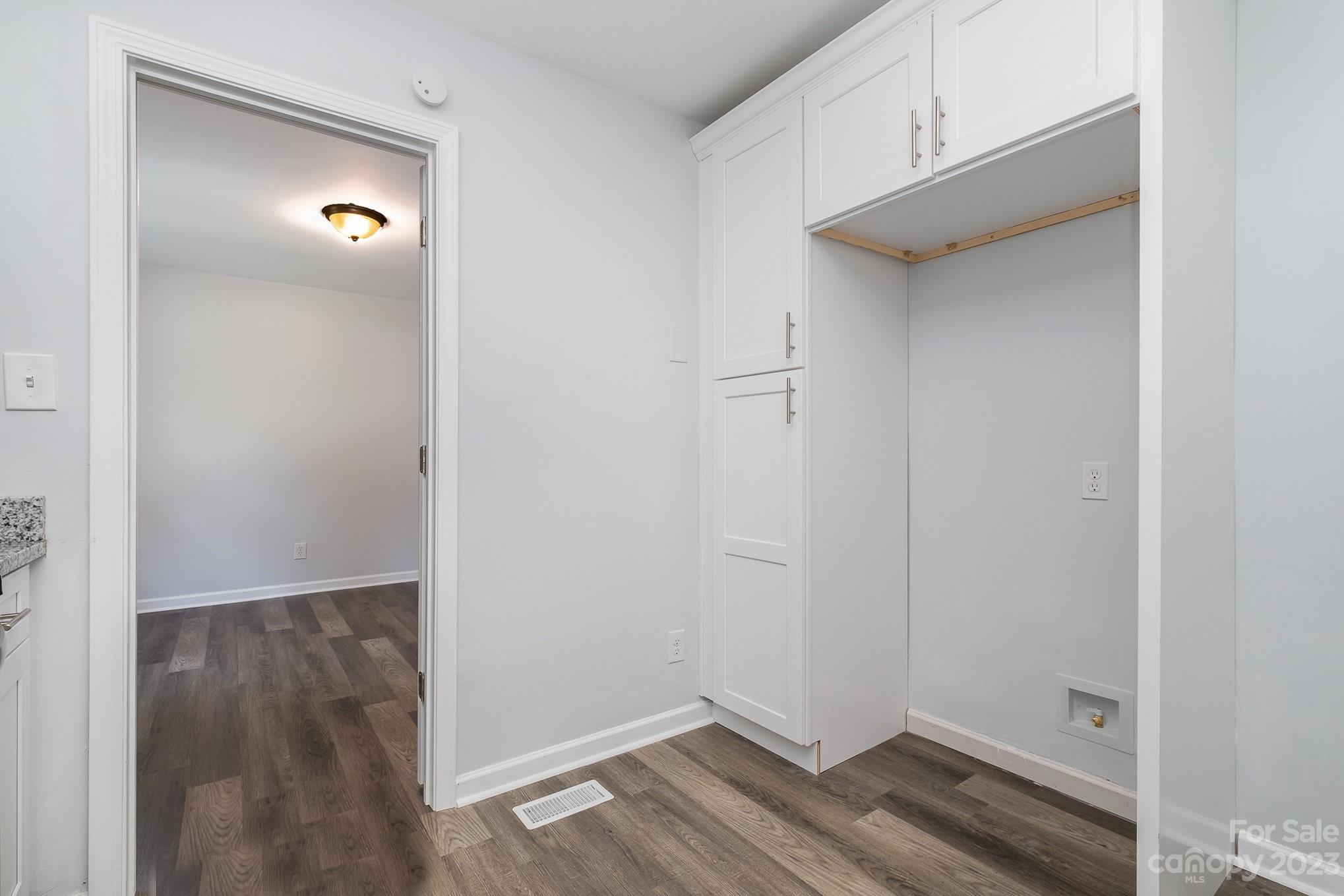 6364 Monteith Drive Charlotte, NC 28213 - Photo 18 of 35 a view of hallway with wooden floor