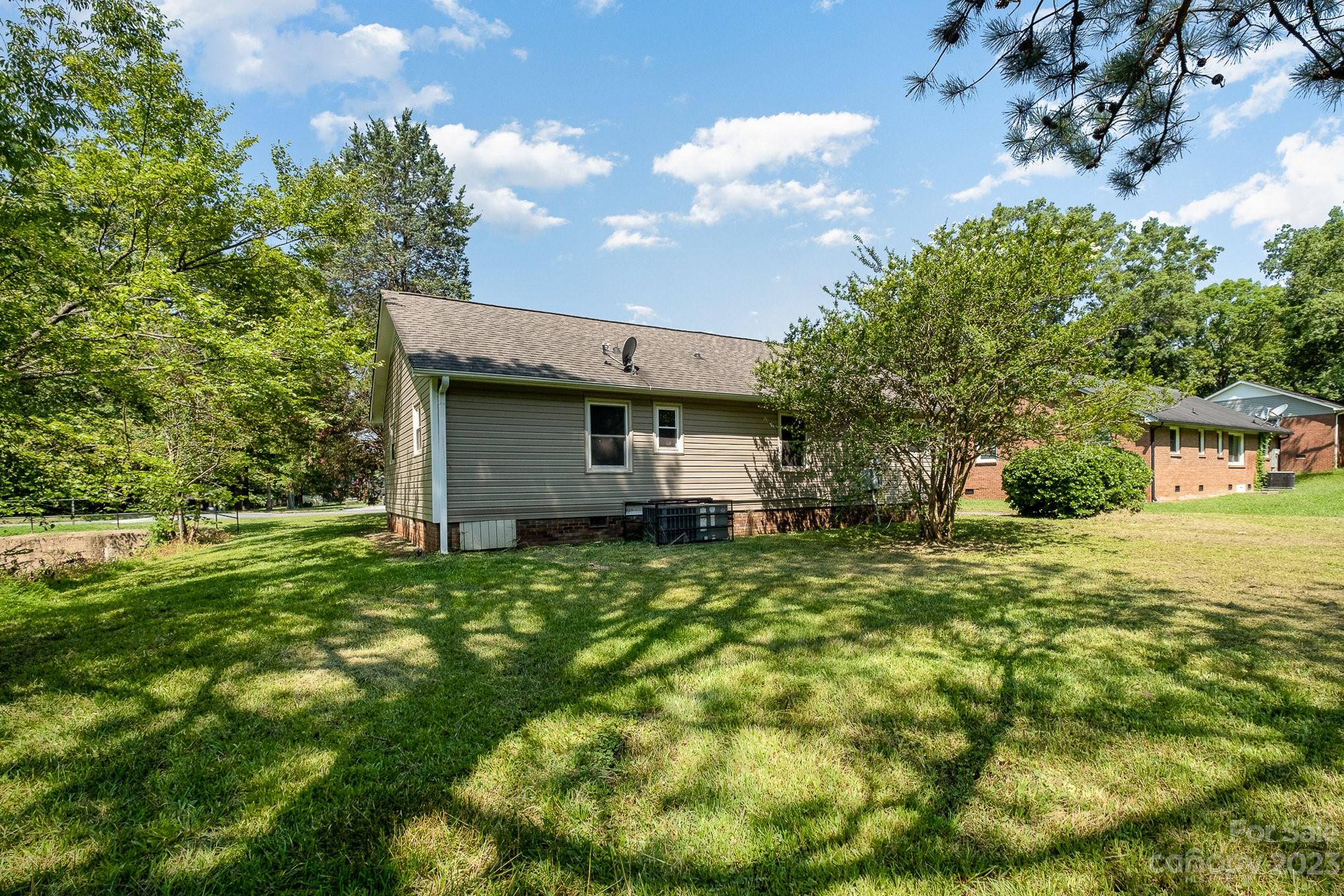 6364 Monteith Drive Charlotte, NC 28213 - Photo 31 of 35 a house view with a garden space