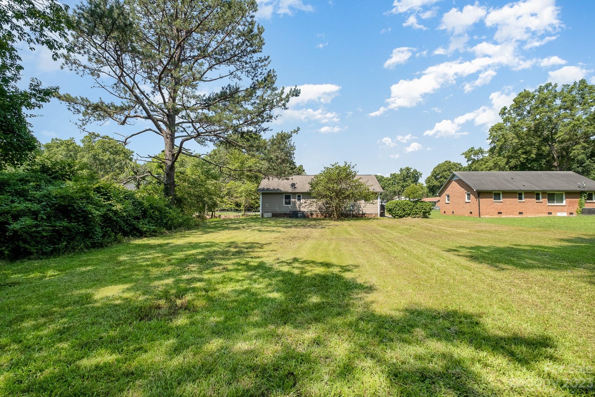 6364 Monteith Drive Charlotte, NC 28213 - Photo 34 of 35 a view of a house with a yard