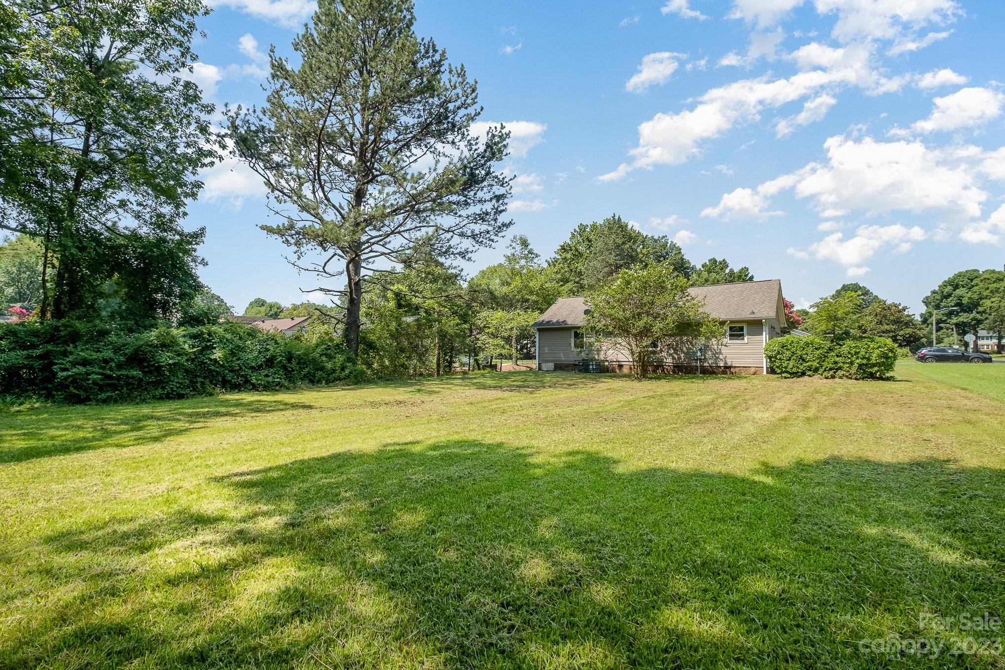 6364 Monteith Drive Charlotte, NC 28213 - Photo 35 of 35 a view of a field of grass and trees