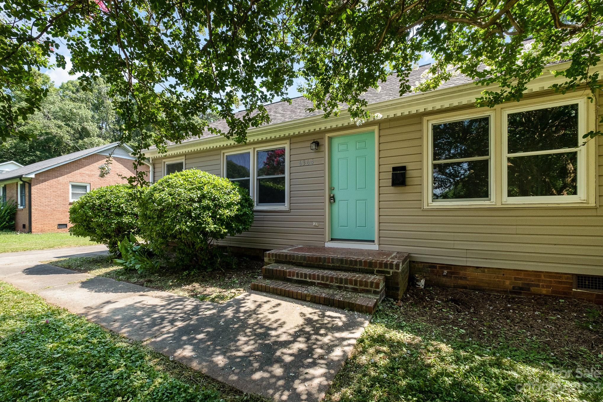 6364 Monteith Drive Charlotte, NC 28213 - Photo 4 of 35 a view of a house with a yard
