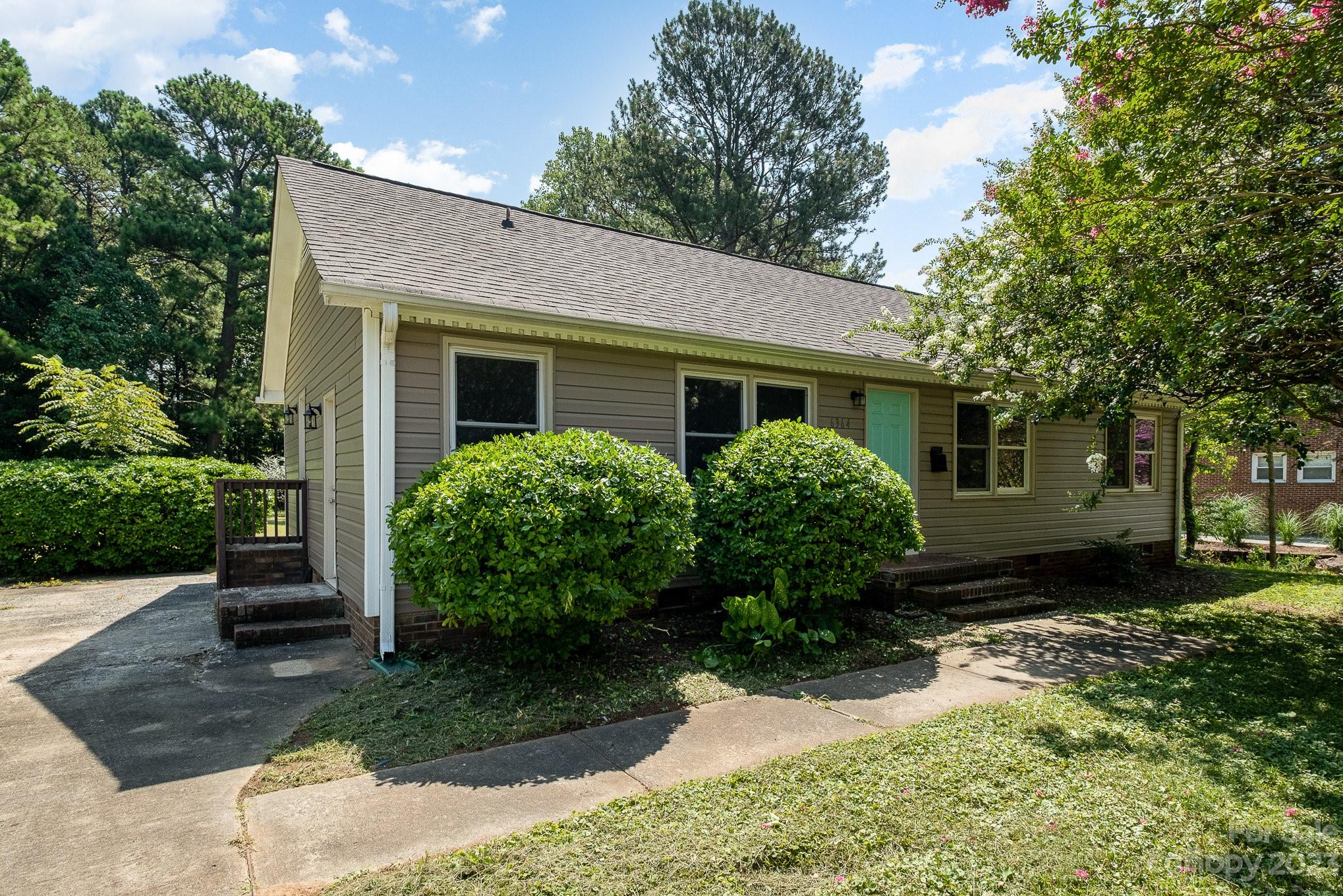 6364 Monteith Drive Charlotte, NC 28213 - Photo 6 of 35 a view of a house with a yard