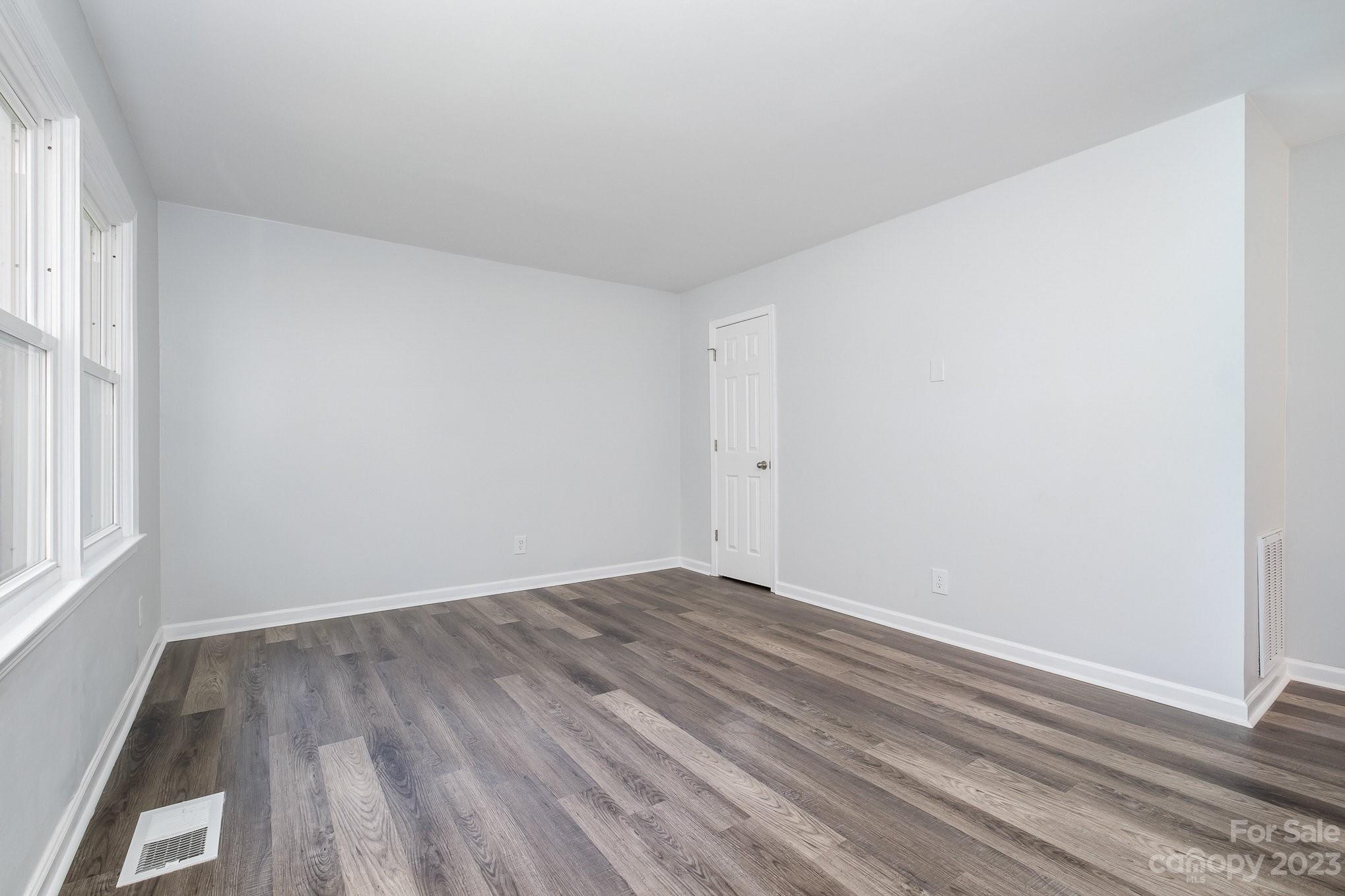 6364 Monteith Drive Charlotte, NC 28213 - Photo 8 of 35 a view of room with window and hardwood floor