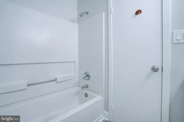 a bathroom with a bathtub