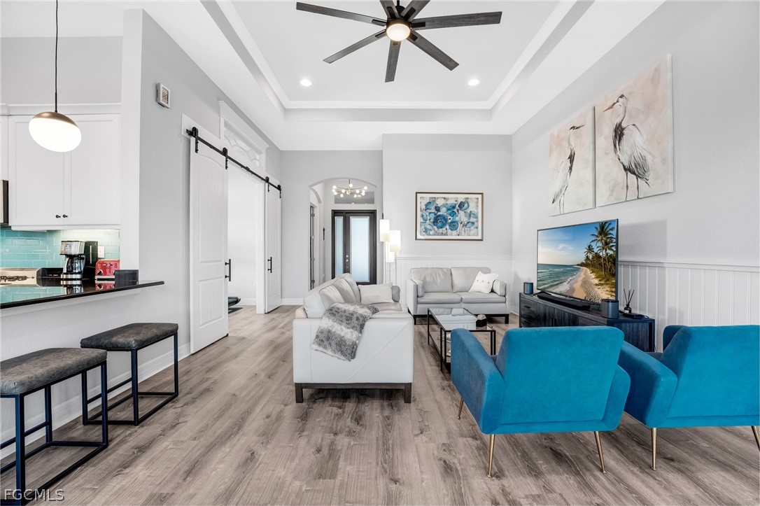 2999 Willow Ridge Court Fort Myers, FL 33905 - Photo 15 of 50 a living room with furniture and a fireplace