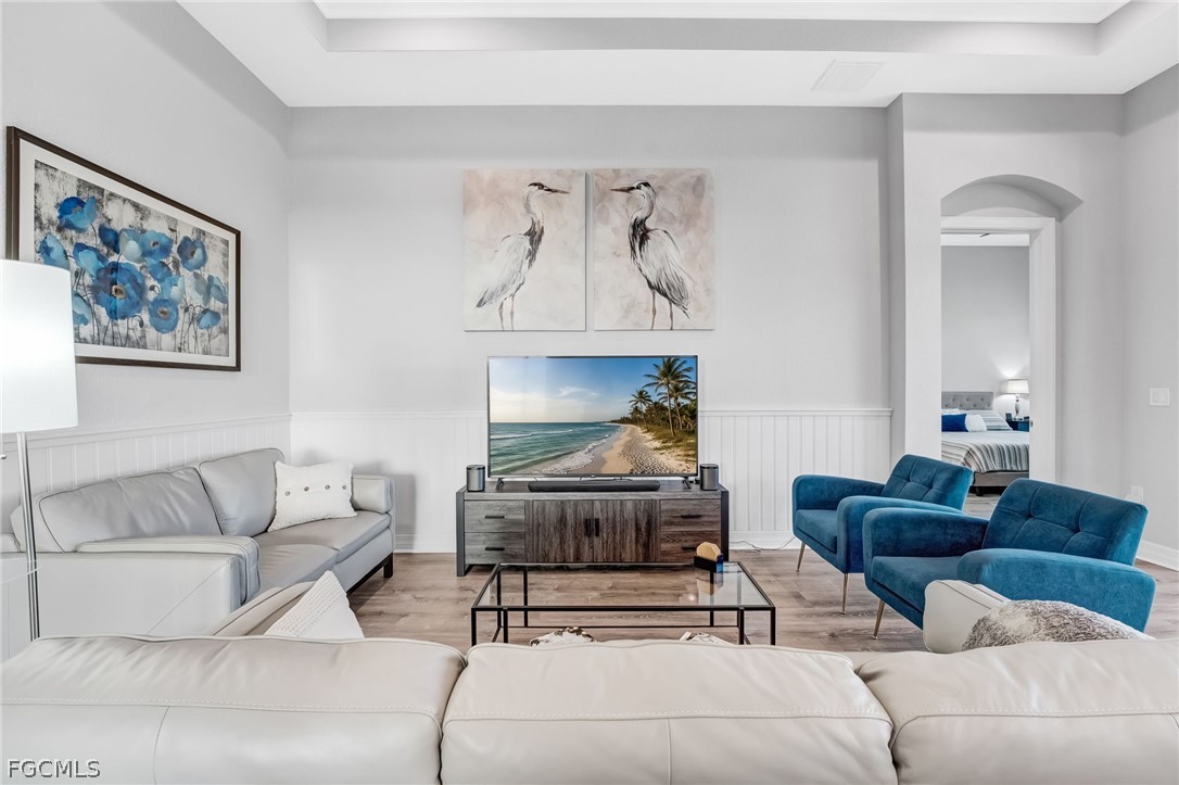 2999 Willow Ridge Court Fort Myers, FL 33905 - Photo 17 of 50 a living room with furniture and a fireplace