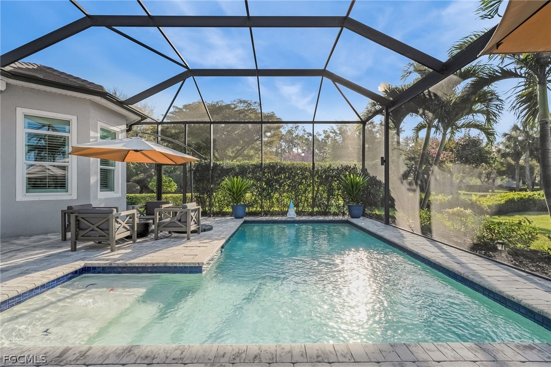 2999 Willow Ridge Court Fort Myers, FL 33905 - Photo 2 of 50 a view of a swimming pool with a patio